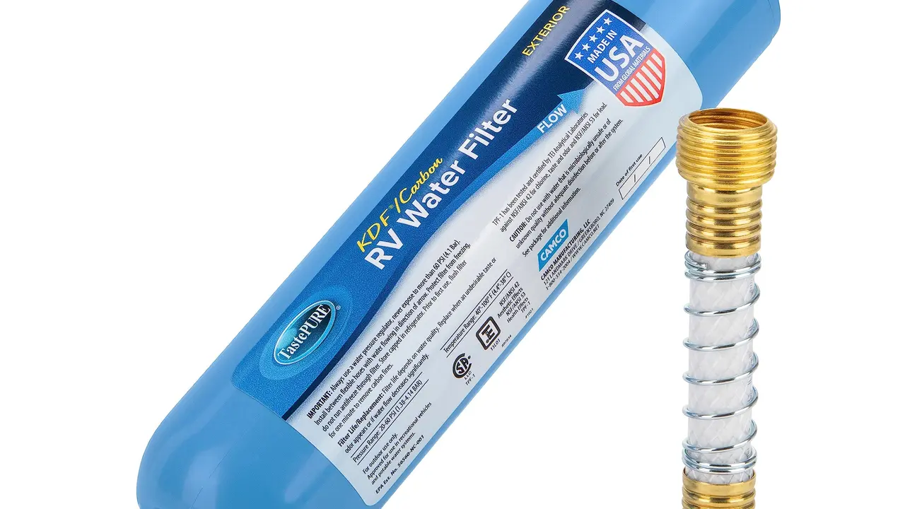 Close up on a plate of mashed potatoes, topped with baked pork chops with cream of mushroom soup, and a side of green beans.